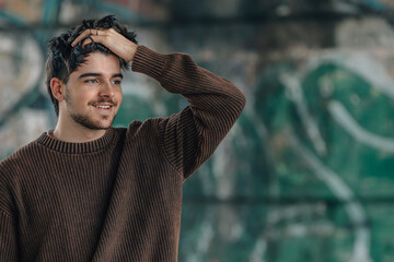 portrait smiling young man on street