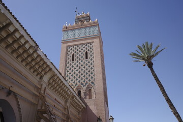 Fototapeta na wymiar Tower of the mosque in Marrakech, Morocco