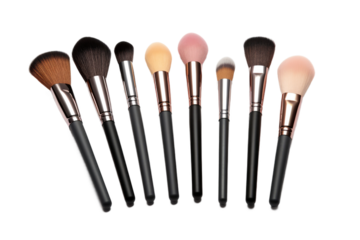 Whimsical Dance of Makeup Brushes. On White or PNG Transparent Background..