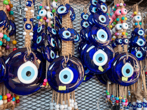 evil eye bead in turkish culture, big evil eye bead close up in gift shop,
