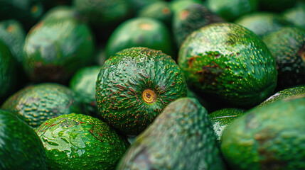 background of bright green fresh ripe avocados - close-up, food advertising 