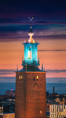 Stockholm, Sweden. Close View Of Famous Tower Of Stockholm City Hall. Popular Destination Scenic In Sunset Twilight Dusk Lights. Evening Lighting. - 764606221