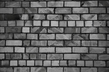 old brick wall close up in gray color