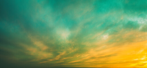 Cloudy sky at sunset. Cloudy sky background. Horizontal banner - 764614602