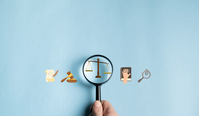 Concept of legal advice in companies. Magnifying glass with law icon for business legal advice, labor law. Lawyer, labor justice. - obrazy, fototapety, plakaty