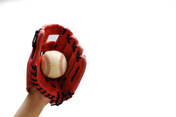 Hand in leather baseball glove catching ball isolated on white background