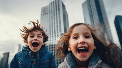 girl with boy laughing against the background of tall city buildings, joy against the background of urbanization - obrazy, fototapety, plakaty