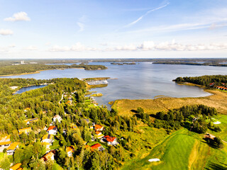 Aerial view of the Archipelago of Helsinki during autumn time in a clear blue sky