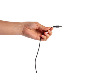 Hand and black audio cable aux isolated on white background