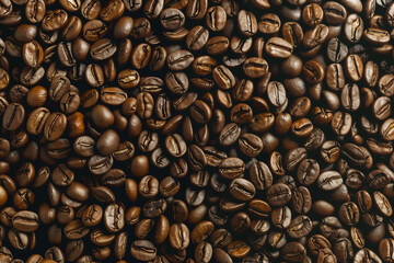 A captivating close-up image capturing the rich, dark tones and intricate textures of roasted coffee beans. Ideal for projects related to coffee, beverages, or gourmet food. Background - 764645083