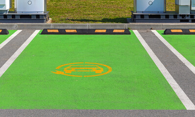Green Parking Place Reserved for Electric Vehicles Only