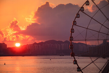 Sunrise Over Hong Kong’s Iconic Ferris wheel in the Central District