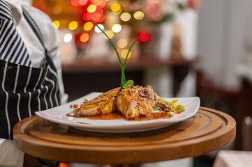 Chicken main course served by chef