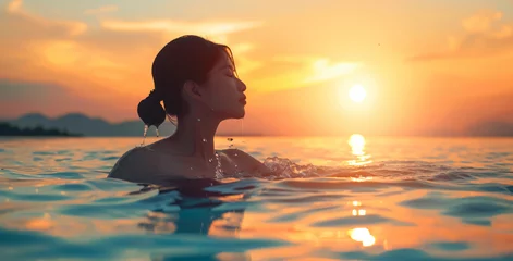 Zelfklevend Fotobehang silhouette of woman relaxing in water at sunset, in the style of emotional sensitivity, serene faces, backlight, joyful and optimistic.Ai © Impress Designers