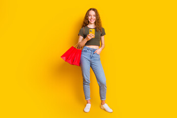 Photo of adorable cheerful woman wear trendy clothes enjoy online shopping fast delivery service...