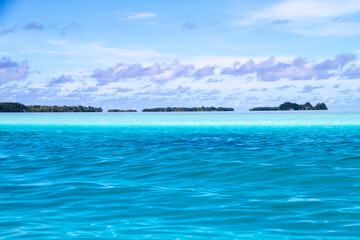 Enchanting Vista: Palau’s Rock Islands Amidst Crystal Waters, Pacific Ocean