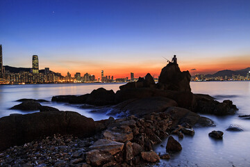 A Tranquil Evening: Hong Kong’s Sunset Silhouette, Lee Yue Mun - obrazy, fototapety, plakaty