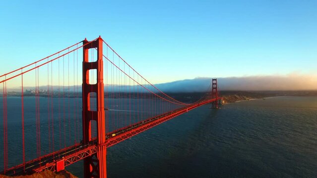 Aerial Forward Shot Of Cars Moving On Famous Golden Gate Bridge, Drone Flying Forward Over Wavy Bay - San Francisco, California