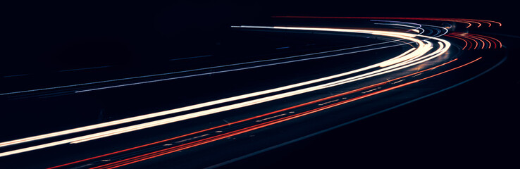 lights of cars driving at night. long exposure