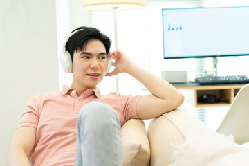 Photo of young Asian man at home