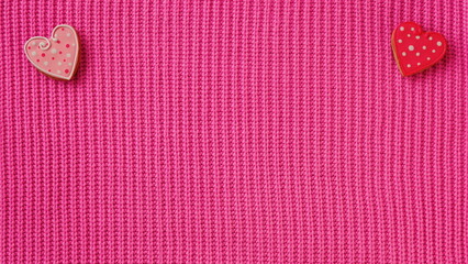 Heart-Shaped Buttons On Pink Knit Fabric. A Top View Showing Two Decorative Elements On A Textured Background