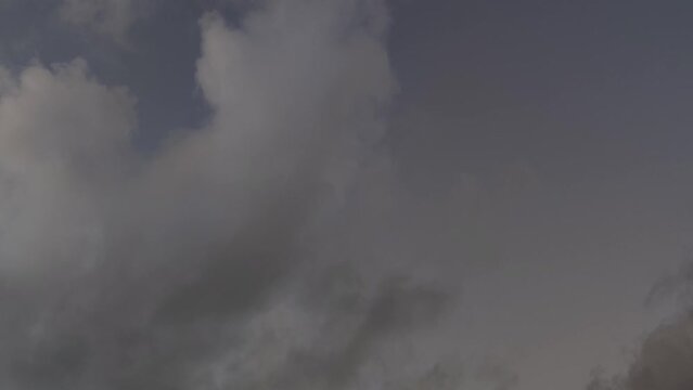 Anil sky with gray clouds