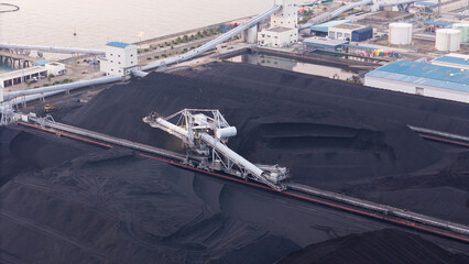 mining shovels, coal mine excavator working loading coal mine to Coal-fired power plant . Giant wheel of bucket wheel excavator in a brown coal open pit.