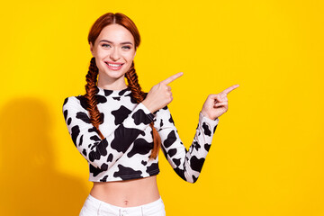 Photo of excited cheerful lady dressed cowskin top showing two fingers empty space isolated yellow color background - 764682098