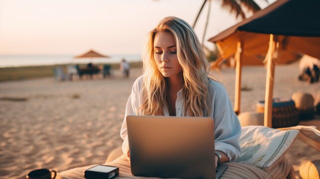 Young woman working on laptop, on a trip, remote work concept, banner