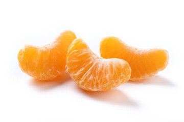 Fresh tangerines slices isolated on white background