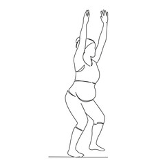 pregnant woman practicing utkatasana yoga
