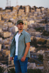 Young Man Posing On The City View Background In Amman, Jordan