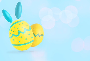 Easter eggs on pastel blue background. Copy space