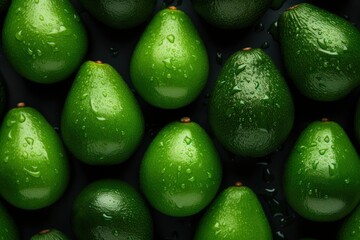 Avocado close-up top view. Ripe organic avocado fruits, healthy wholesome food. Avocado background