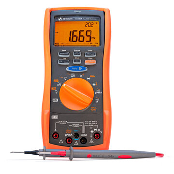 Durban, South Africa - NOVEMBER 01 2023: Keysight U1282A True RMS Digital Multimeter with Lit Display and Probes on White Background
