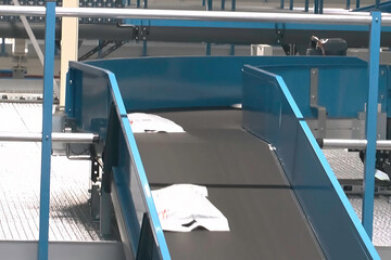 Obraz premium Conveyor belt. Conveyor belt manufacturing quality control.