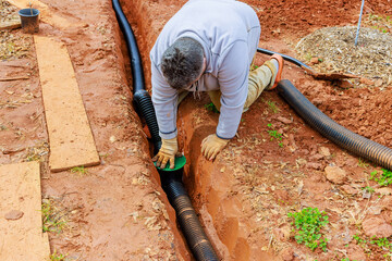Laying underground drainage pipes for outflow of rainwater stormwater