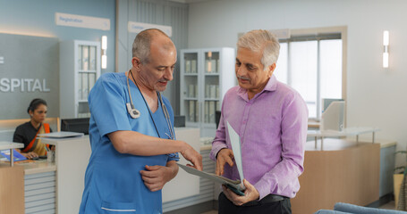 Indian Healthcare Service: Professional Medical Doctor Talking to His Patient, Sharing Good News...