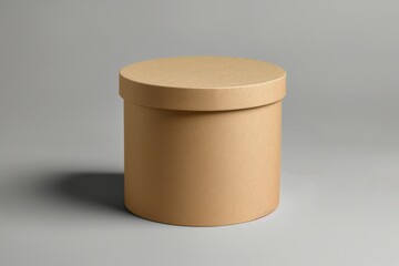 Round brown paper box mockup on grey background