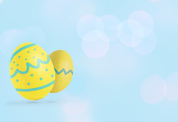 Easter eggs on pastel blue background. Copy space