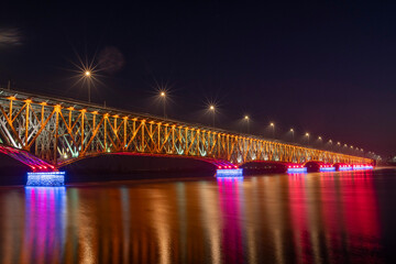 Bridge of the Legions of Josef Pilsudski at night with colorful lighting. Plock, Poland