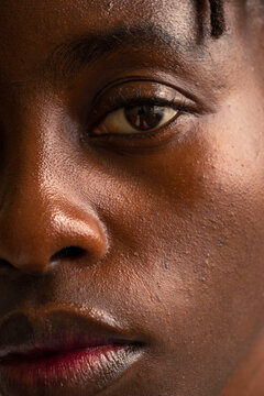 A close-up of a black woman's face