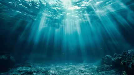 Fotobehang Underwater Serenity: Sunlight Piercing Through Ocean Depths © Farnaces