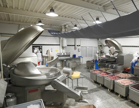 Preparation of minced meat at meat processing plant. Raw materials for sausages and sausages.