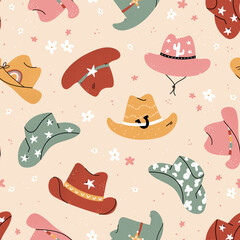 Fototapeta premium Lovely illustrated cowboy hats with different ornaments, cactus, horseshoe, stars. Vector hand drawn illustration, seamless pattern, great for textiles, wallpapers, wrapping.