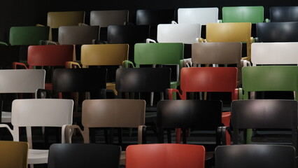 colorful chairs for the audience. colorful chairs arranged in rows