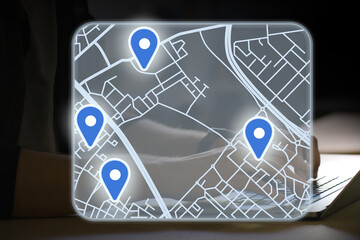 fictional software with with map and highlighted locations and places hovering as a hologram in...