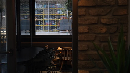 stone wall and seating area of coffee shop