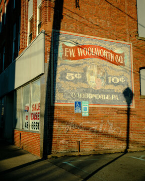 F.W. Woolworth Co vintage sign in Carbondale, Pennsylvania