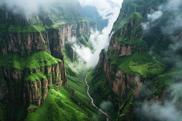 Cinematic shot of the view from above, looking down at an epic mountain range with clouds rolling...